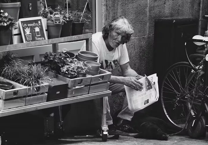 Street vendor at work behind a counter